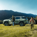 family in front of 2026 Chevy Equinox