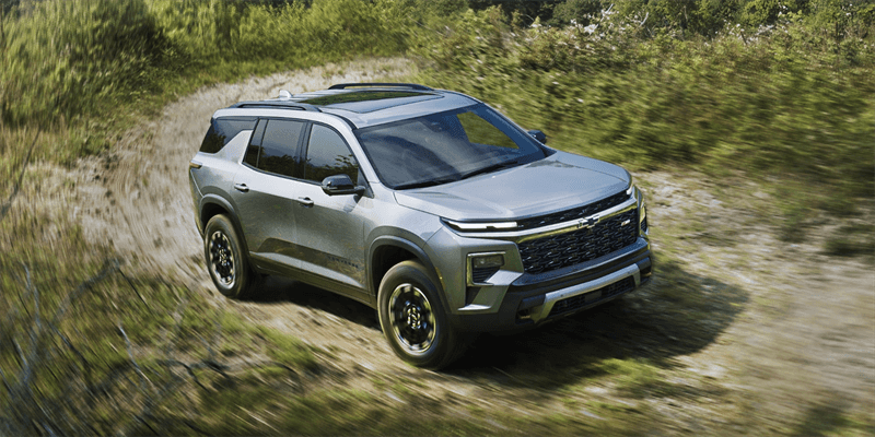 2026 Chevy Traverse driving on a backroad