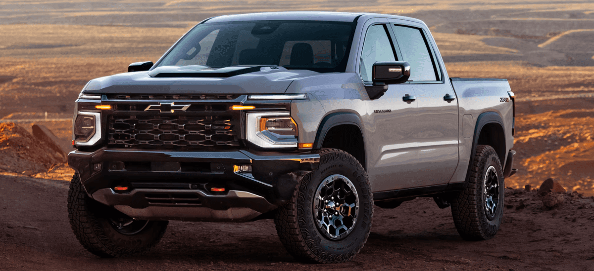 Gray 2027 Chevrolet Silverado 1500 parked on a hilltop