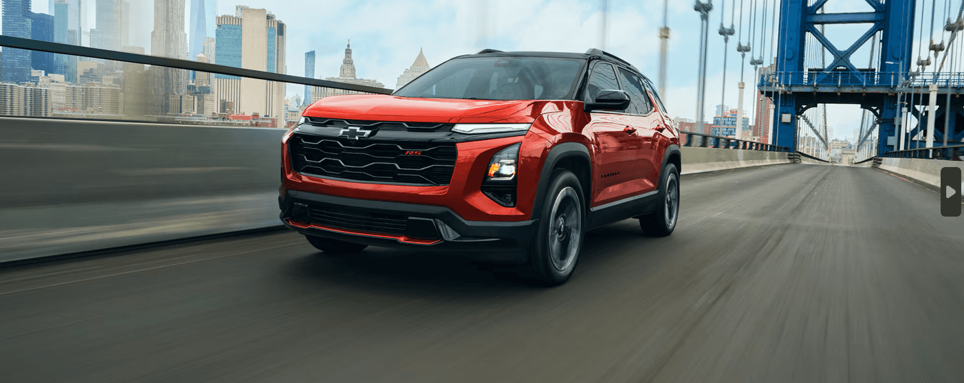 Red 2027 Chevrolet Equinox Driving Down 