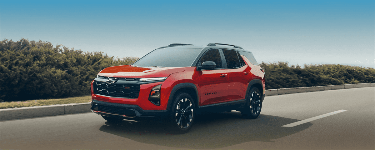 2027 Chevy Equinox driving on the road