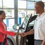 Shaking hands in the Chevy dealership