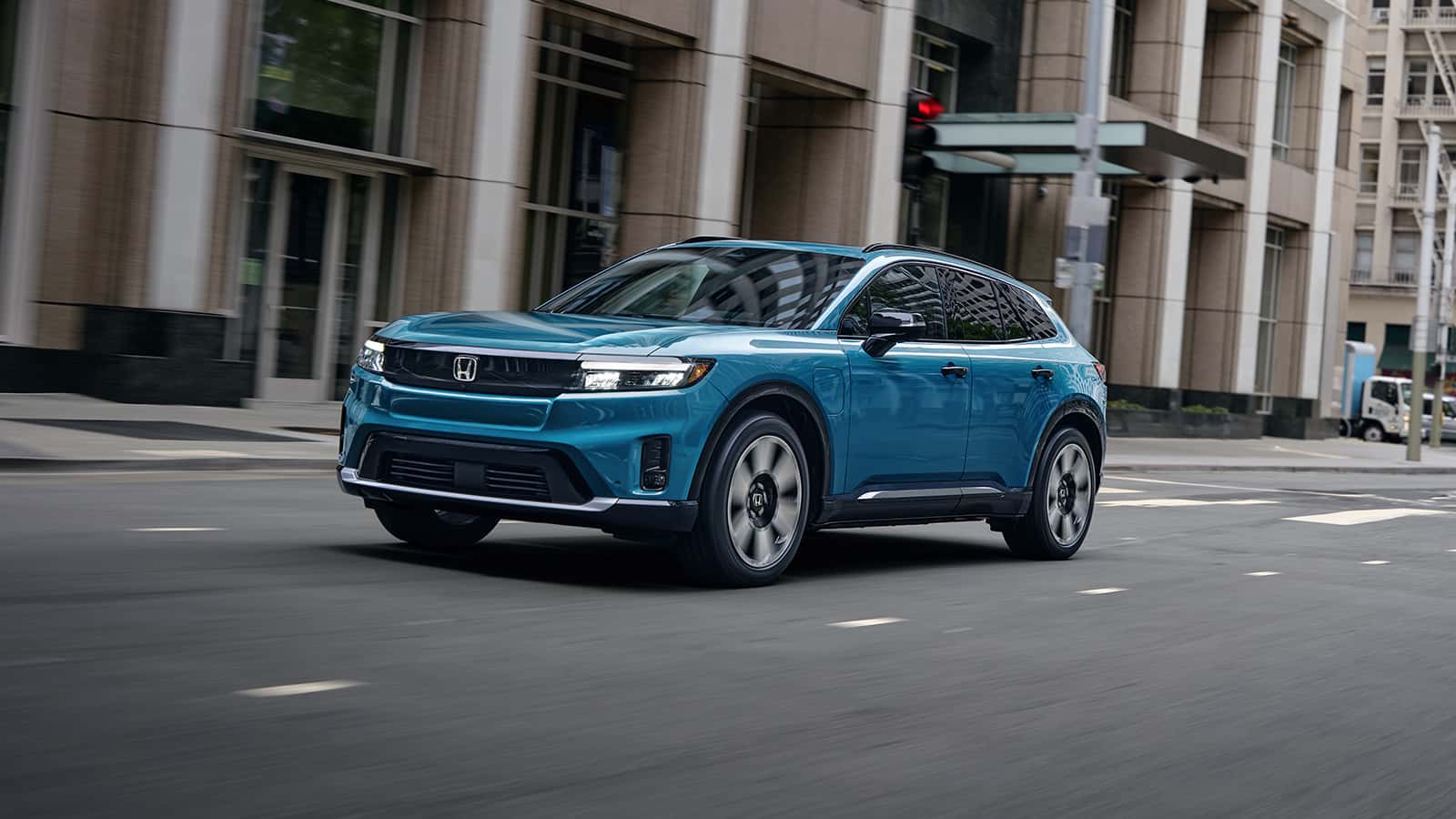 Electric SUV driving in Henderson