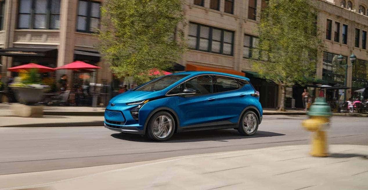 2023 Chevy Bolt EV on busy street