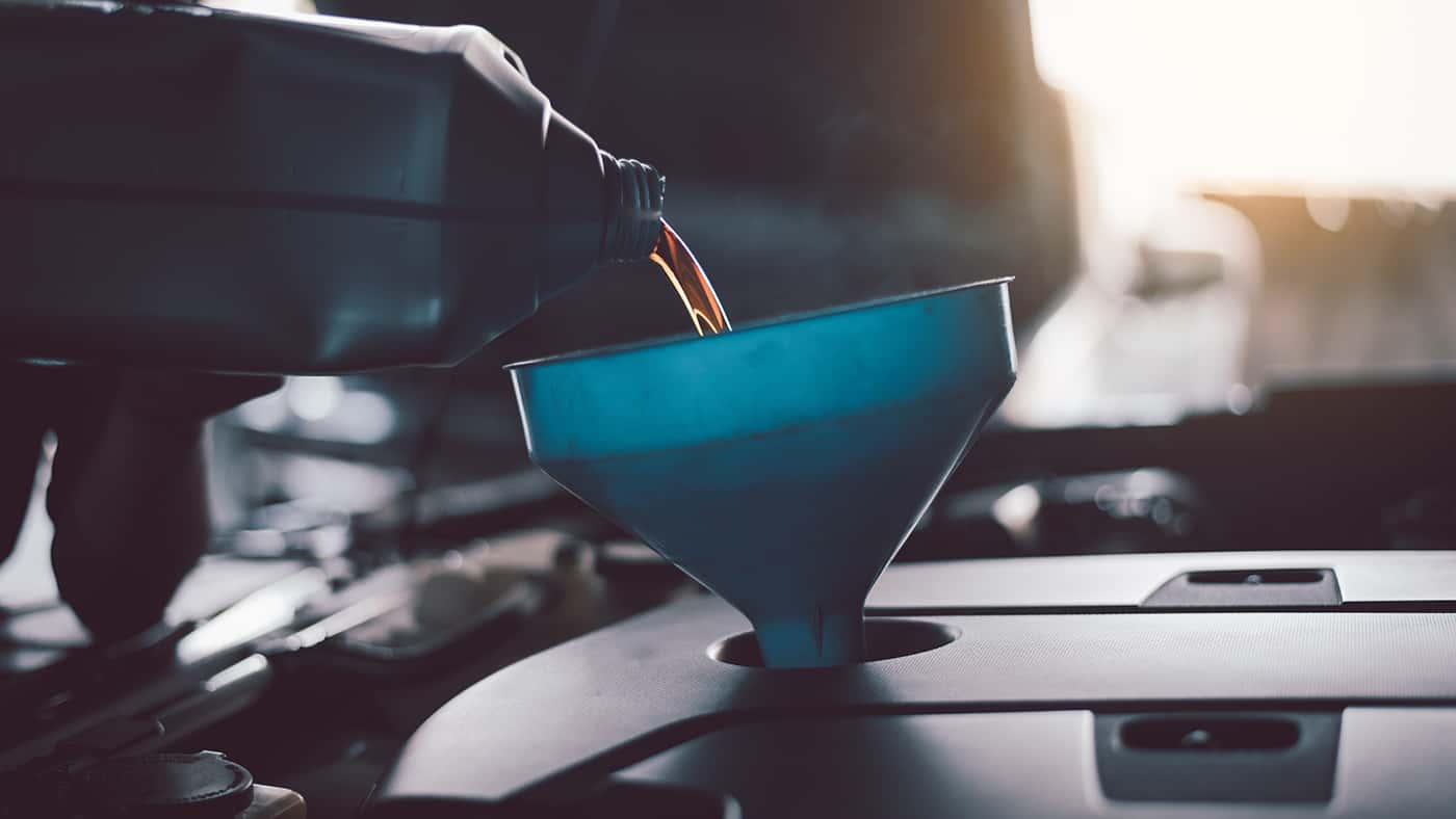 Adding Fresh Oil to a Car Engine