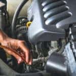 refilling the transmission fluid in a car in Racine, WI
