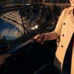 woman unlocking her car