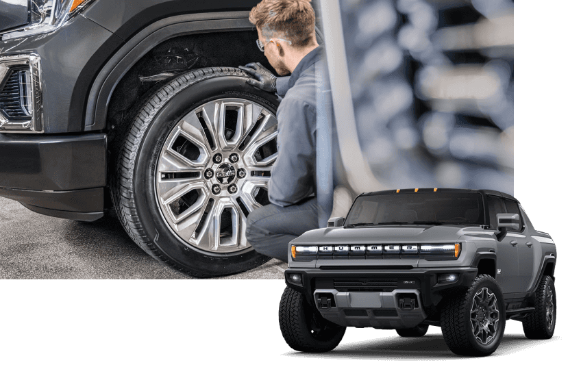 Technician working on driver side wheel