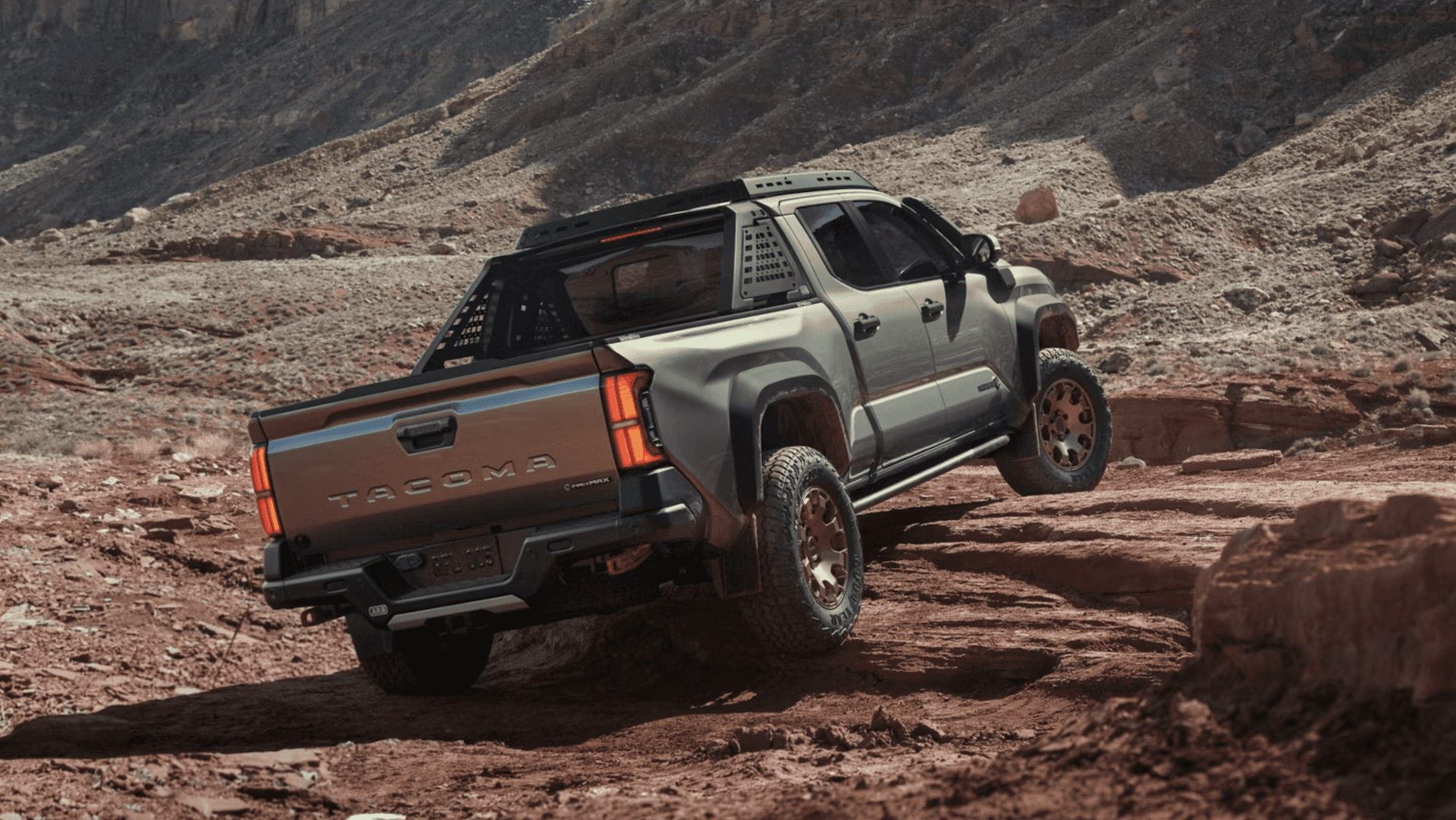 2025 Toyota Tacoma Trailhunter in Bronze Oxide with available roof rack accessory for sale near Spring, TX