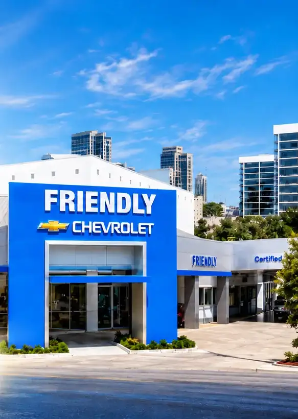 The Friendly Chevrolet storefront today, with its blue Friendly Chevrolet entrance