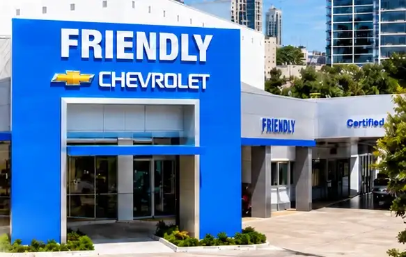 Now: the modern Friendly Chevrolet storefront in Dallas