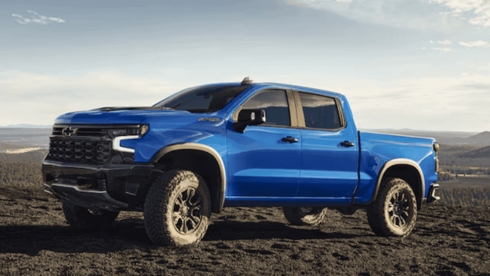 2026 Chevrolet Silverado parked on rugged terrain, showcasing winter-ready performance and capability trusted by Spindale, NC commuters