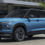2026 Chevrolet Trailblazer driving through city streets in winter conditions, highlighting family-friendly design and cold-weather handling for Spindale, NC drivers