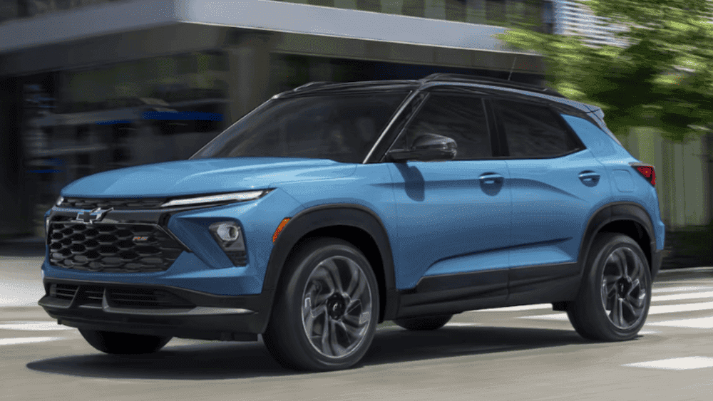 2026 Chevrolet Trailblazer driving through city streets in winter conditions, highlighting family-friendly design and cold-weather handling for Spindale, NC drivers