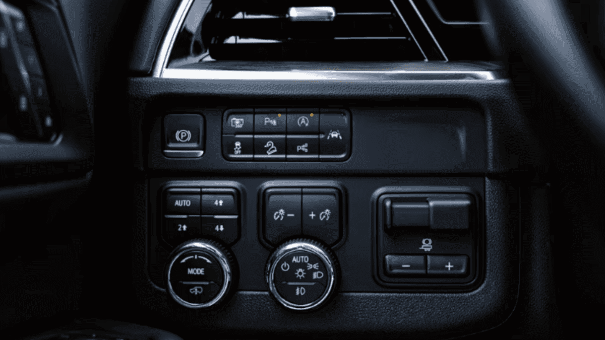 Close-up of climate and drive mode controls in a 2026 Chevrolet Tahoe, showing advanced comfort and traction settings