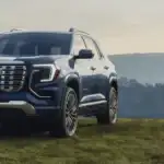 2026 GMC Terrain parked on a scenic overlook, emphasizing efficient SUV performance and everyday practicality for commuters near Ruth, NC