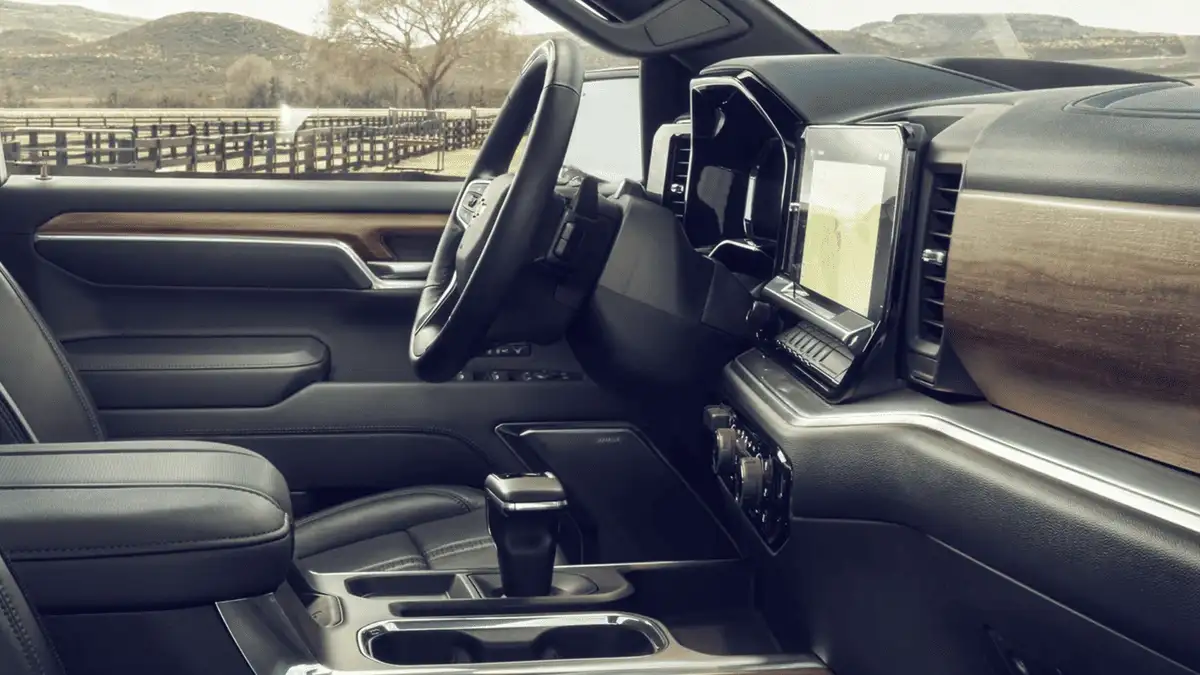 Interior view of 2026 Chevrolet Silverado near Ruth, NC featuring large touchscreen display, premium materials, and modern truck cabin design