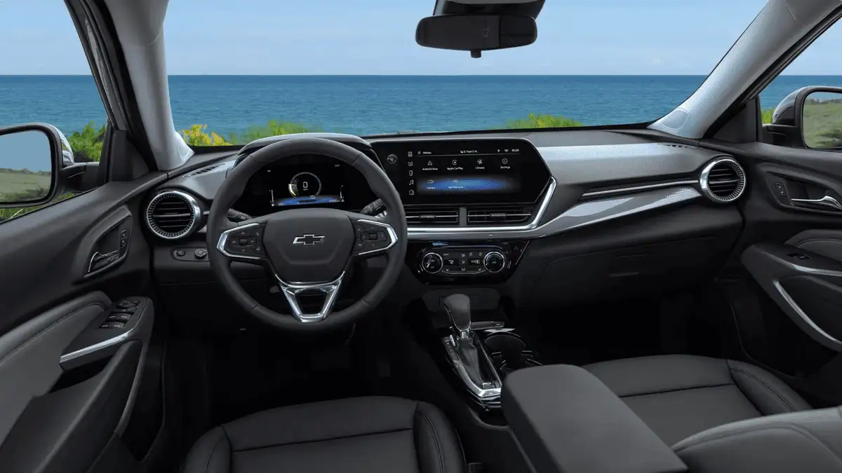 Interior dashboard of 2026 Chevrolet Trax near Ruth, NC featuring digital display, touchscreen infotainment, and comfortable seating layout