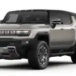 2026 GMC Hummer EV SUV near Ruth NC in silver and black two-tone finish with signature LED light bar, aggressive off-road tires, and bold boxy SUV silhouette on white background