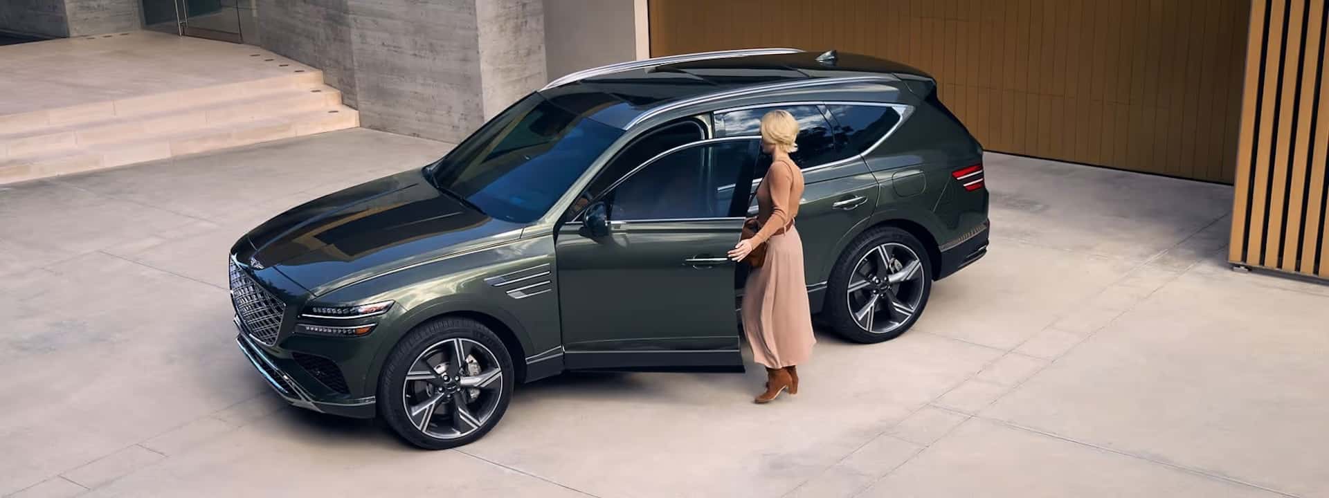 2026 Genesis GV80 Prestige Black Edition Luxury SUV with a proud owner getting ready for an easy and luxurious ride