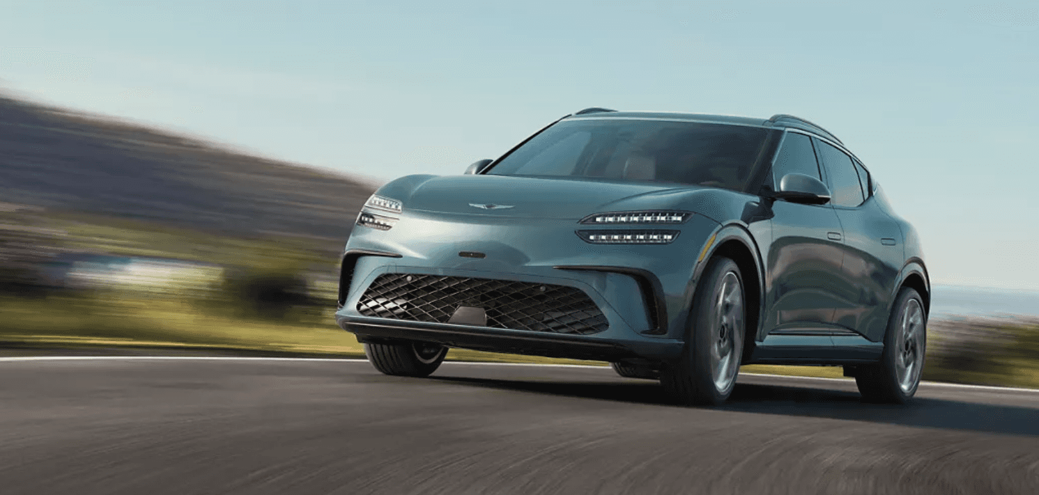 2027 Genesis GV60 going fast on the road