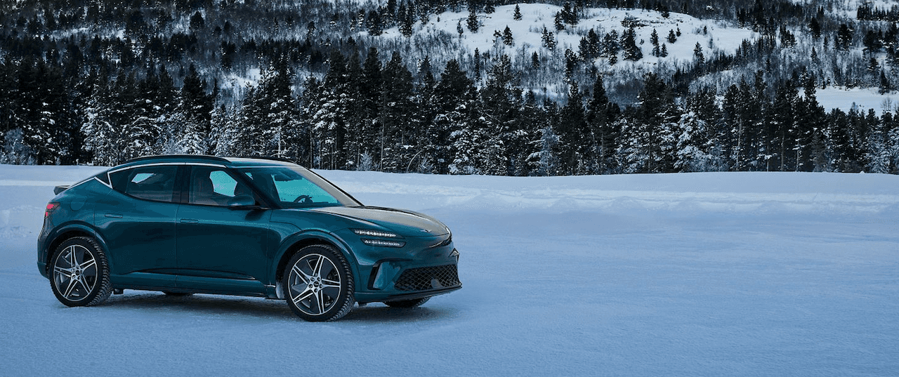 The new 2026 Genesis GV60 exterior in tromso green serving drivers near Metairie, LA