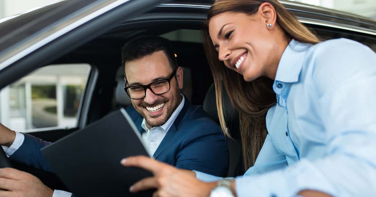 Genesis saleswoman helping a customer