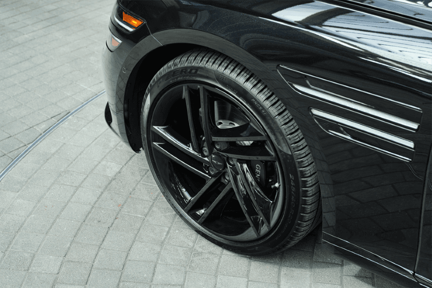 2026 Genesis G80 wheel and side detail close-up.
