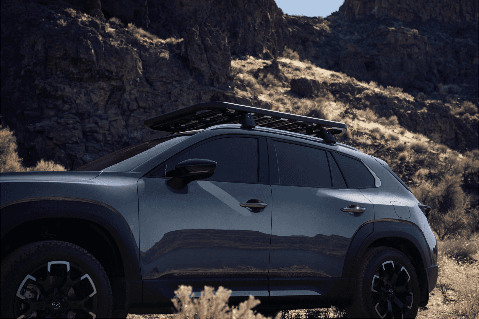 Side profile of MAZDA CX-50 with roof rack in Twin Falls, Idaho