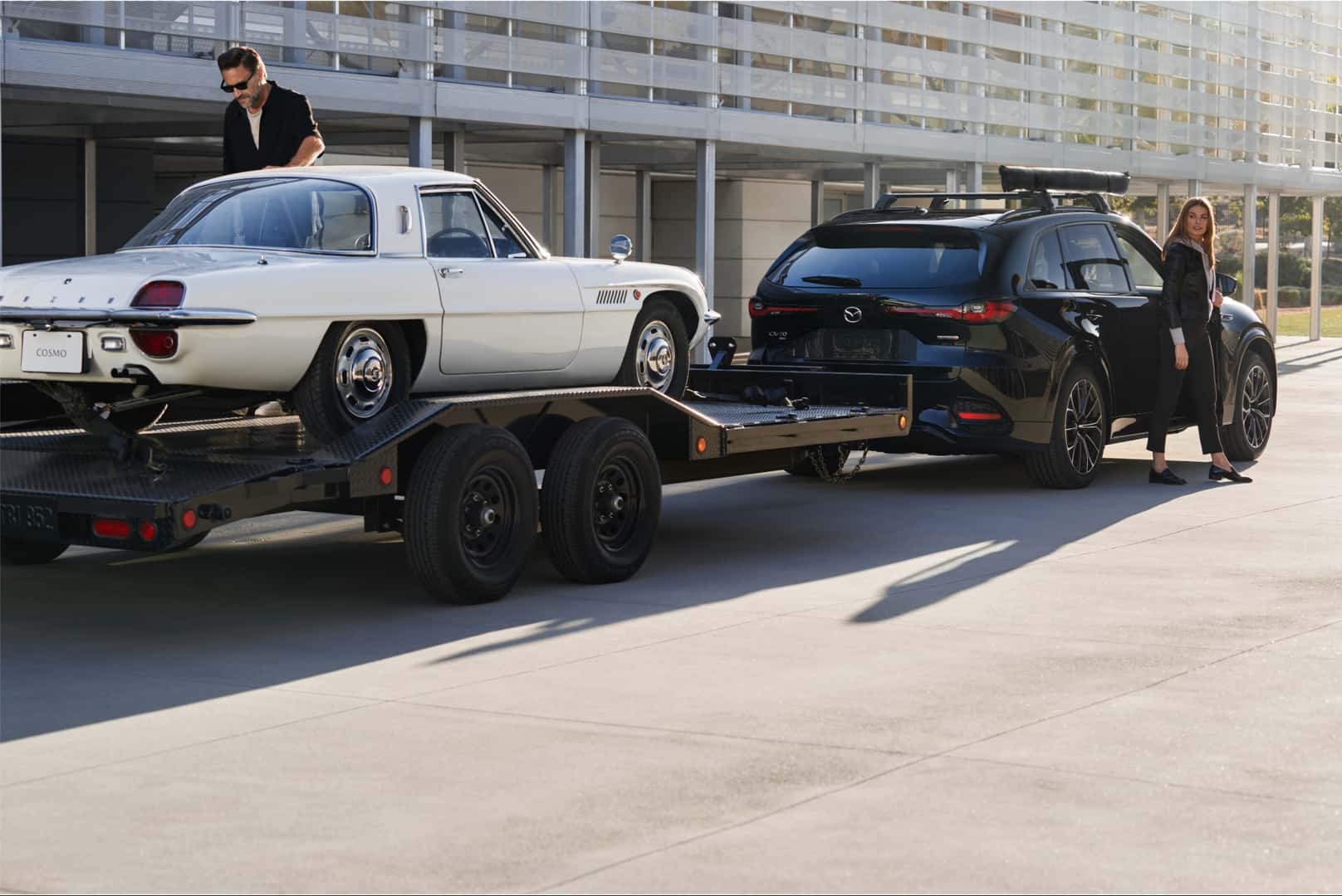 Mazda CX-70 towing a small trailer