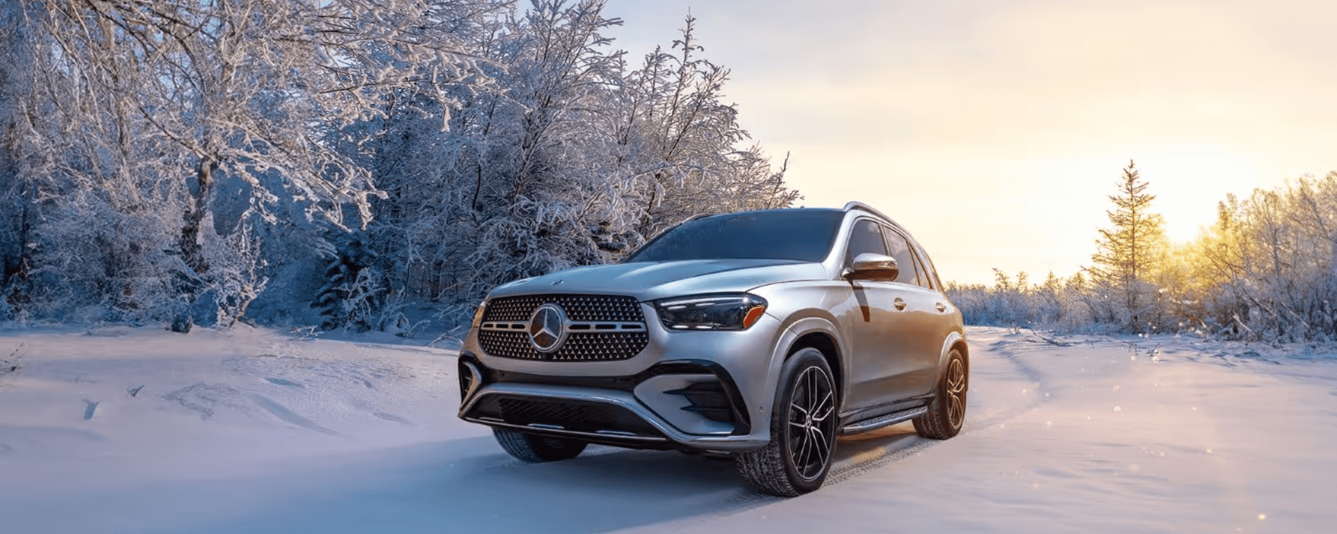 Mercedes SUV driving in winter conditions