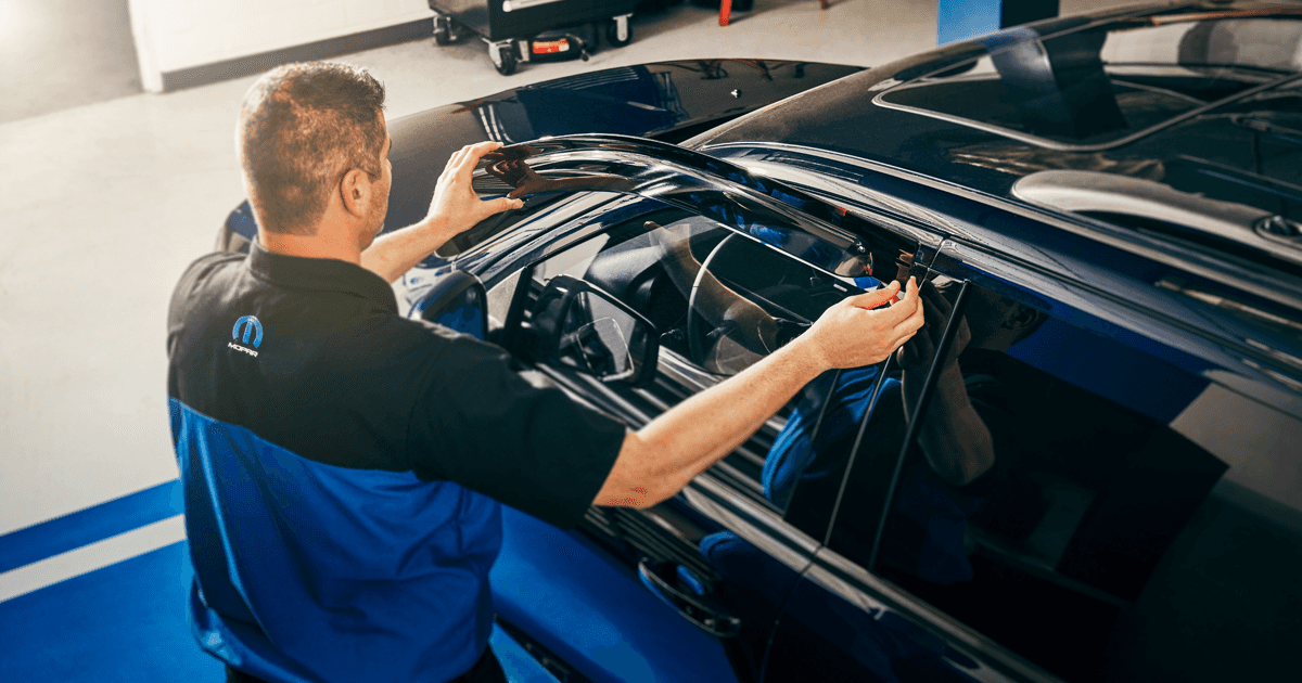 Mopar tech looks at car