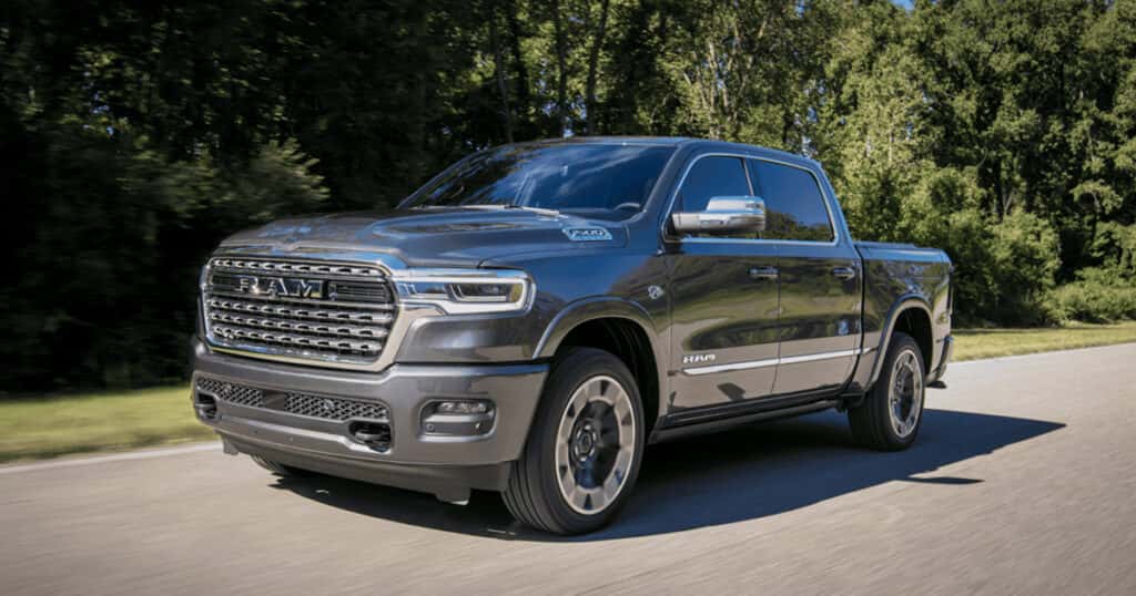 A Ram 1500 pickup truck on the road.