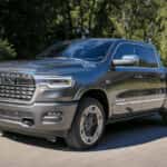 A Ram 1500 pickup truck on the road.