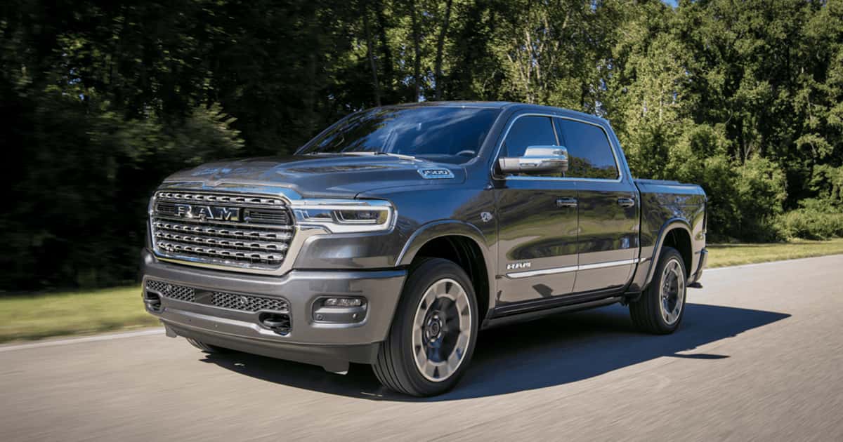 A Ram 1500 pickup truck on the road.