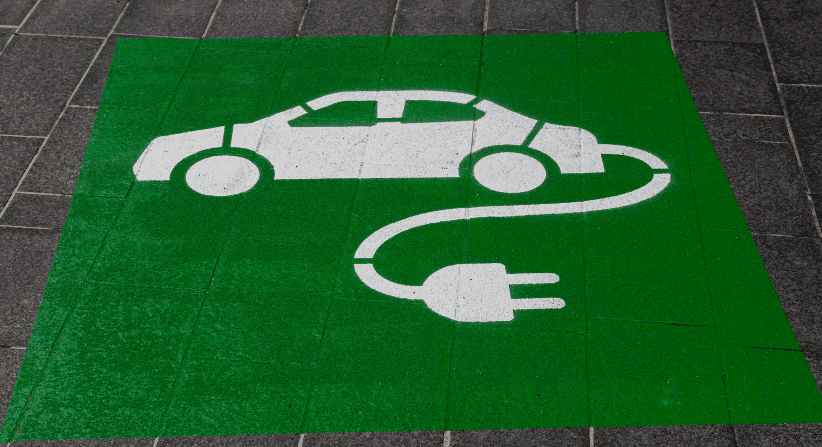 EV chalk drawing on ground