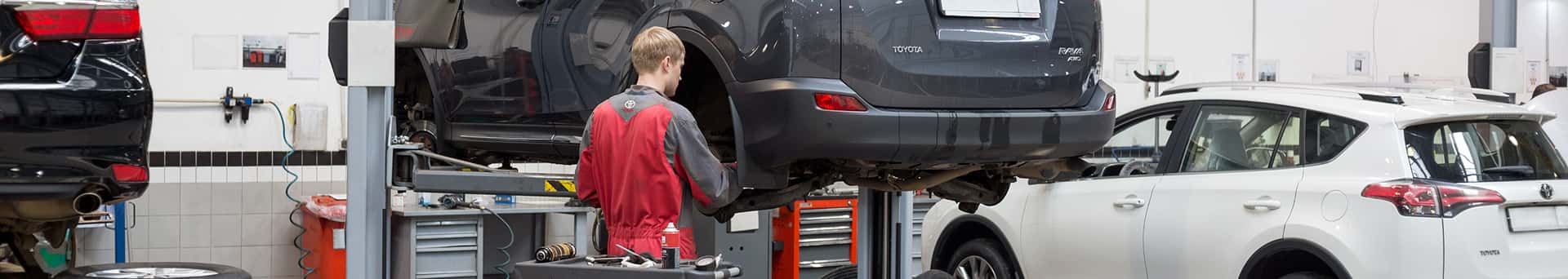 service technician working on tire