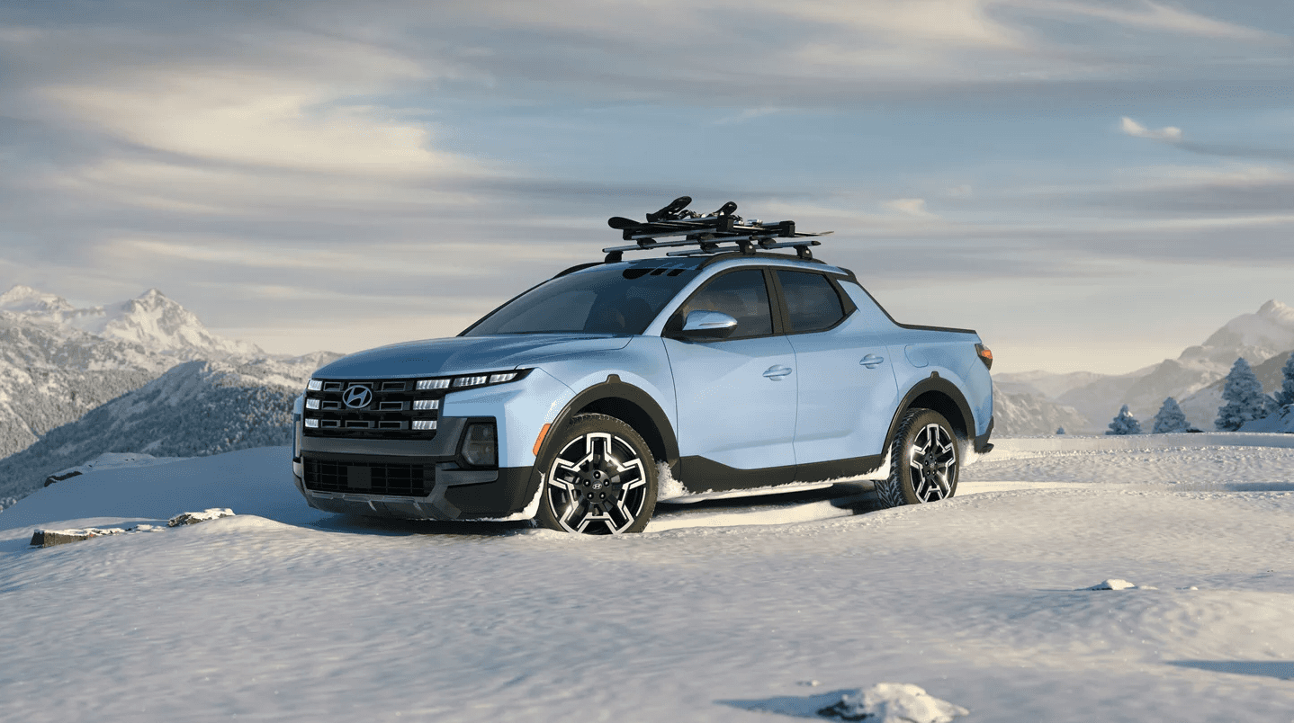 2026 Hyundai Santa Cruz parked on snow with roof rails attached to the top