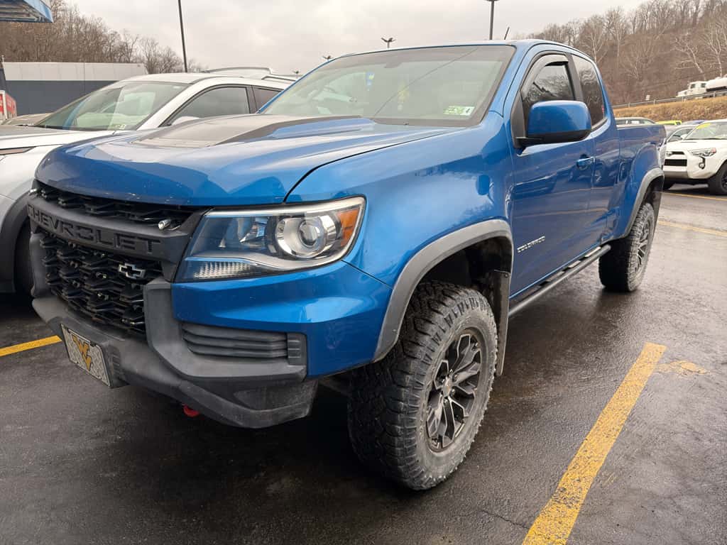 Value Your Trade - blue Chevy parked