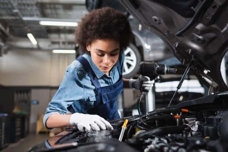 Technician Working on a car