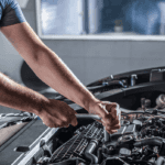 Auto mechanic repairing a car