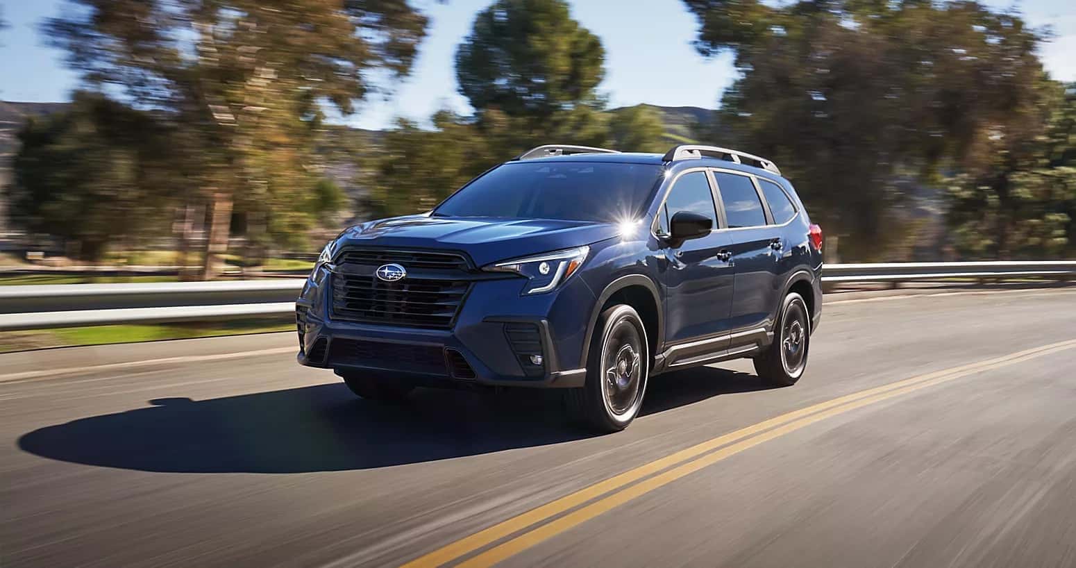 -2025-Subaru-Ascent-Driving-down-road