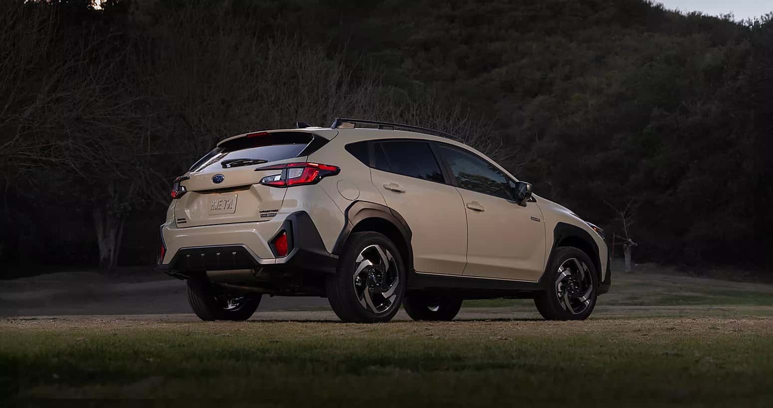 Rear andlge view of a 2026 Subaru Crosstrek hybrid that is white.