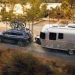 Blue Subaru Ascent pulling a trailer