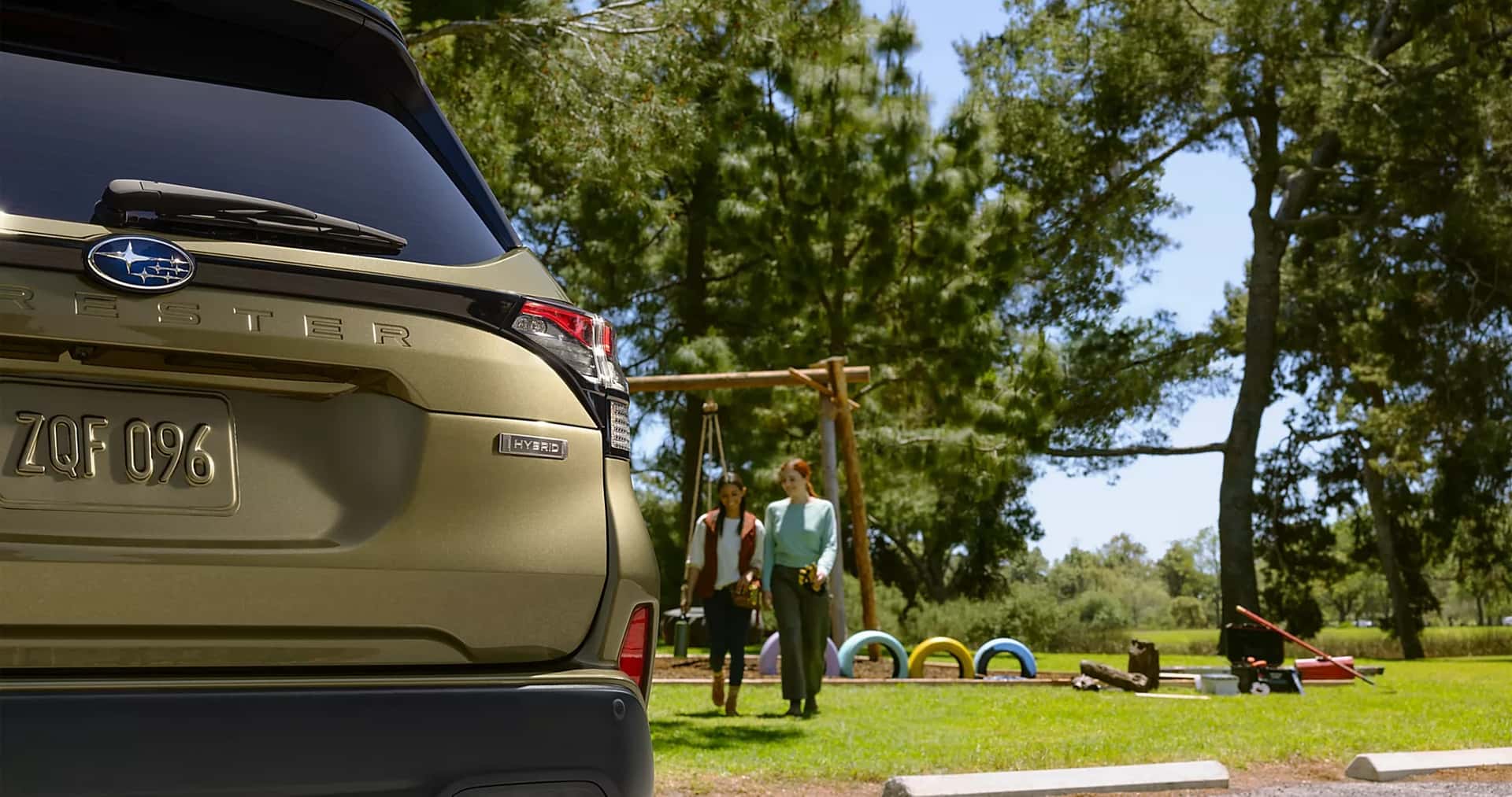 2025 Subaru Forester Hybrid at a park showing rear quarter panel