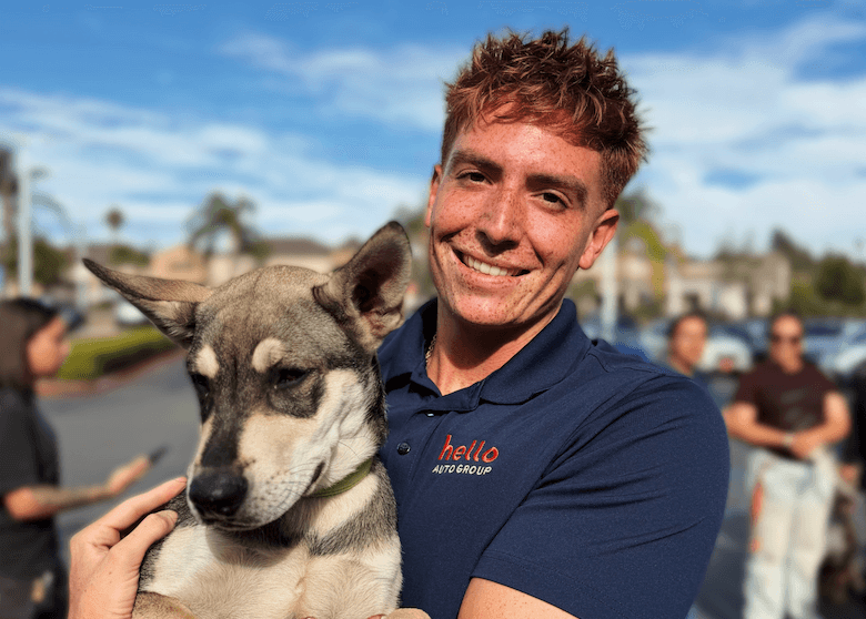 Subaru Client Advisor Holding Dog