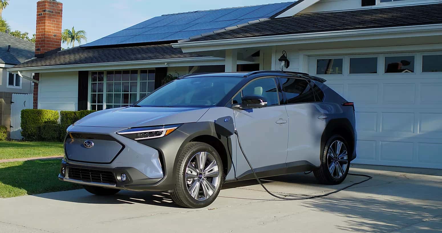 Solterra charging outside of a home.