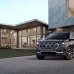 A grey 2018 GMC Terrain Denali parked on a driveway.