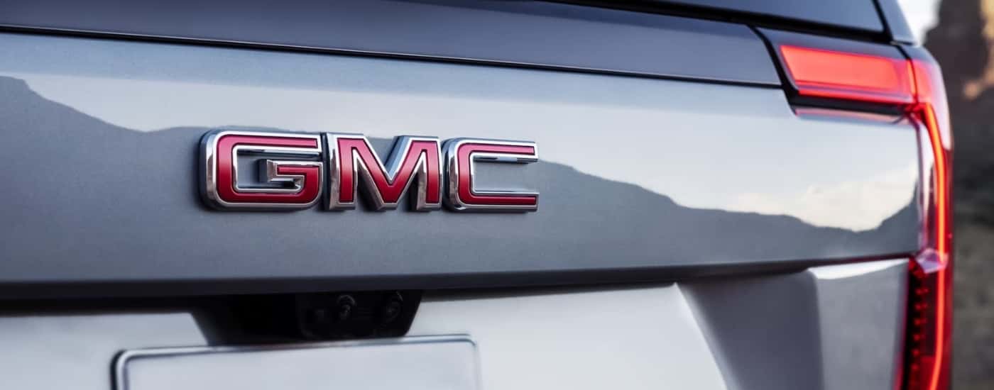 Trunk badge on a silver 2025 GMC Yukon.