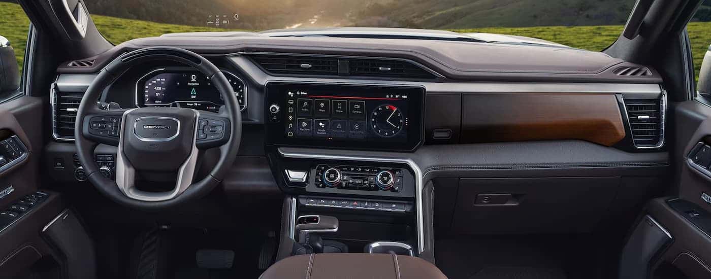 Infotainment and digital gauge cluster on a 2025 GMC Sierra 1500 Denali for sale